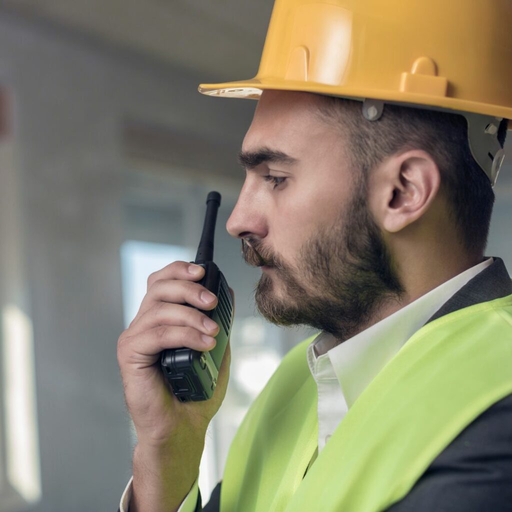 Construction worker with a radio