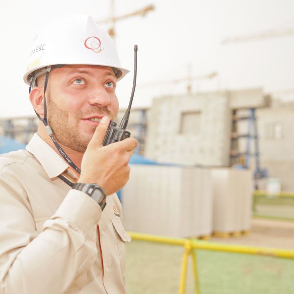 A man working on a 2 way radio