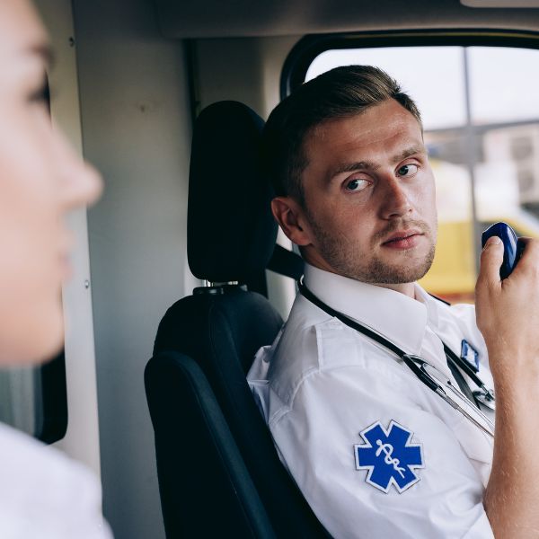 An EMT talking on radio