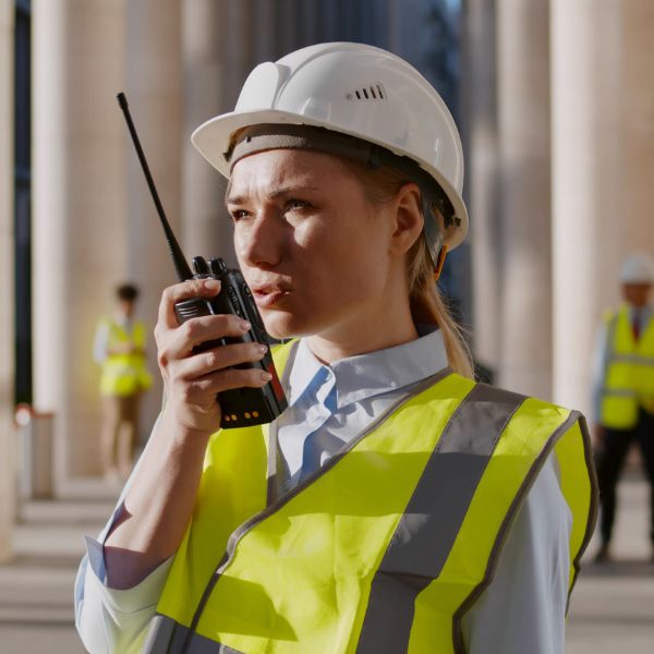A women using a walkie talkie